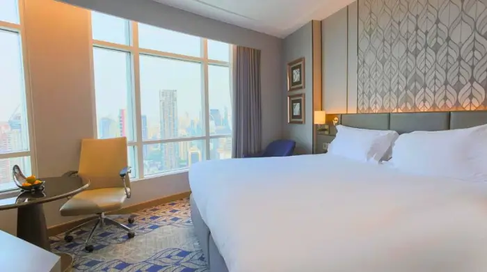 A bright and stylish room at Centara Grand, offering skyline views and steps from Red Sky rooftop bar—perfect for travellers exploring mature nightlife Bangkok. Featured on The Road to Timbuktu, it’s an ideal stay for solo adventurers who like their evenings high up and hassle-free.