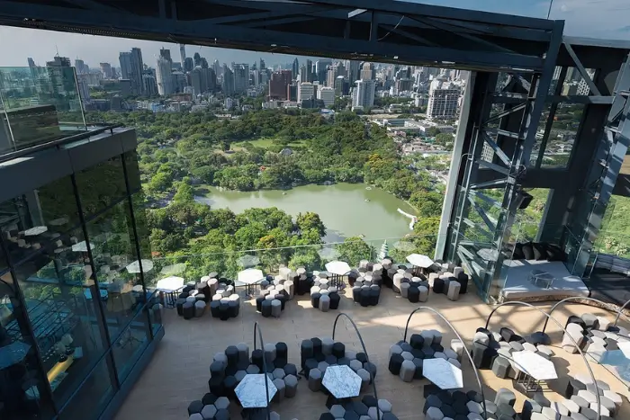 Park Society rooftop bar overlooking Lumpini Park, offering some of the best rooftop views in Bangkok. Featured on The Road to Timbuktu, it’s a laid-back yet luxe setting for solo travellers over 50 who prefer cocktails with a view—and no queue for the loos.