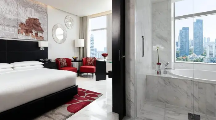 A modern Bangkok suite with city views and a marble bath, located near some of the best rooftop lounges in Bangkok. Featured on The Road to Timbuktu, it’s an ideal base for mature solo travellers who appreciate stylish stays and a cheeky rooftop nightcap within easy reach.