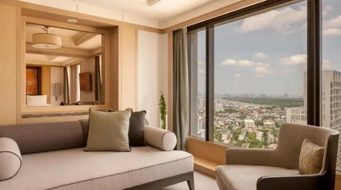 A serene suite at Banyan Tree Bangkok, offering panoramic skyline views and a calm retreat high above the city—an ideal base for solo travel over 50 Bangkok style. Featured on The Road to Timbuktu, this is where mature travellers unwind between rooftop cocktails and cultural adventures.
